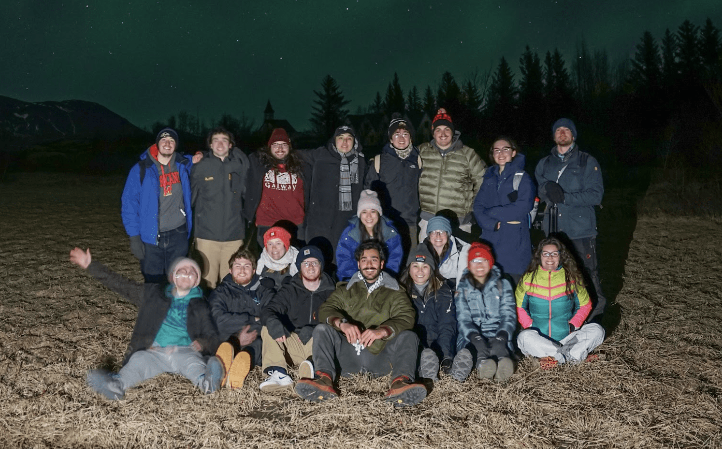 Yazan Hasan (pictured center, wearing green jacket) poses with his UMD-Winter: Iceland cohort. 